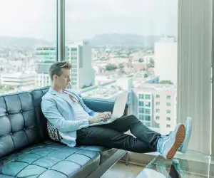 Man working on a laptop from home