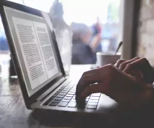 Person working on a laptop