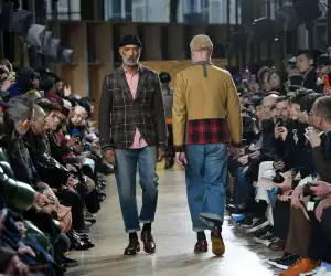 Models present creations from Junya Watanabe during Paris Men's Fashion Week