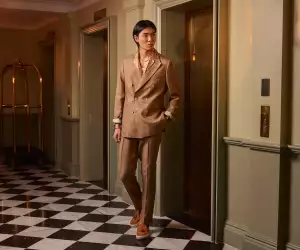 Model wears Frescobol Carioca suit
