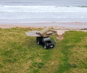 Land Rover Defender near a beach